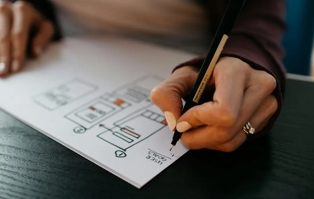 Hand sketching website wireframes